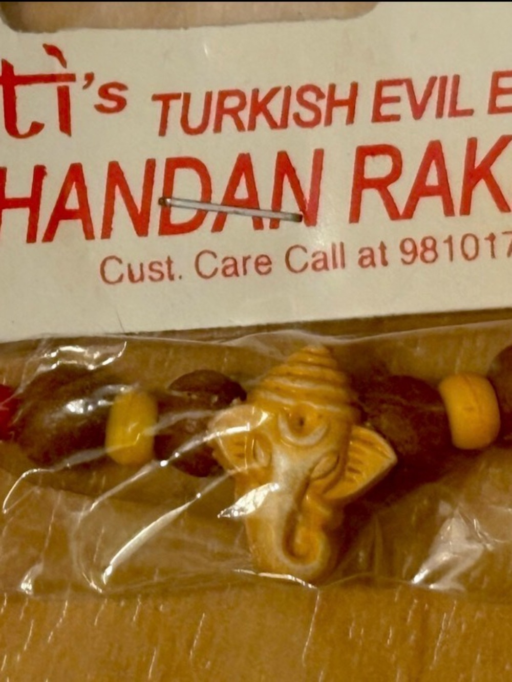 Evil Eye Rakhi Handmade Beaded Bracelet with Elephant Accent - Yellow & Brown